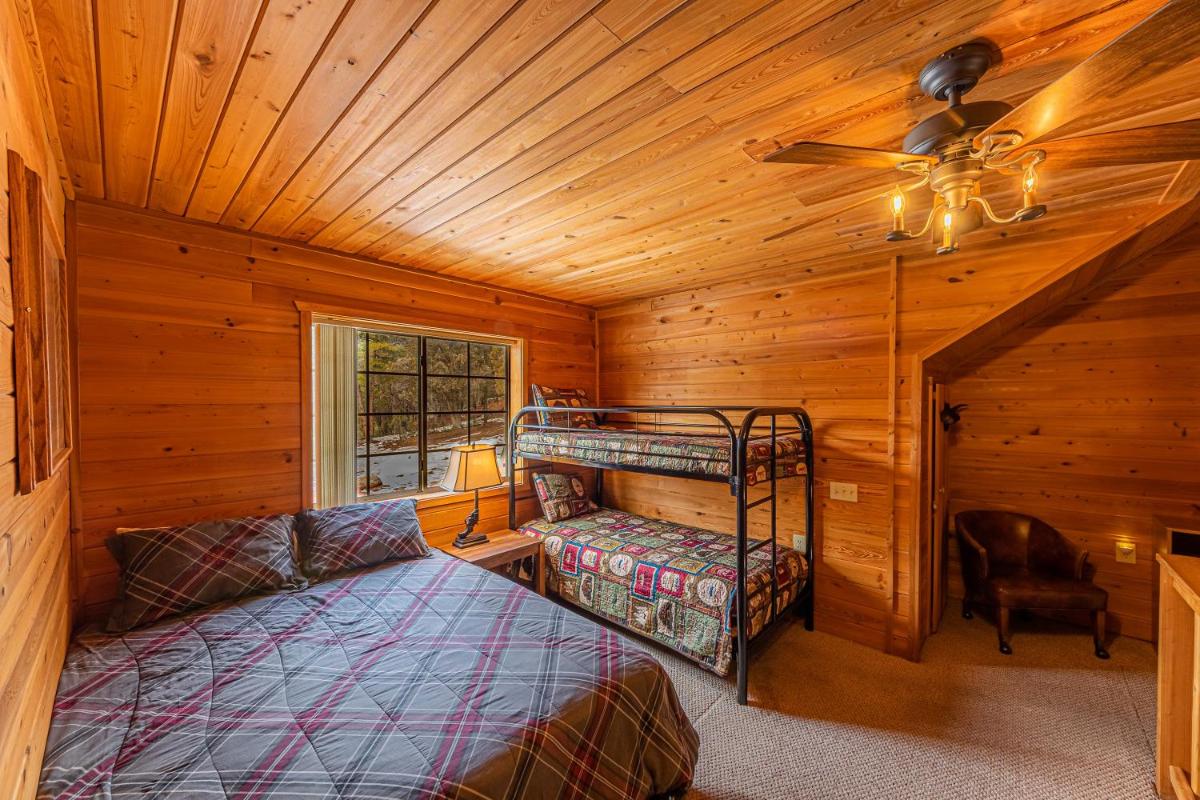 Cabin #4 The Wolves Den – Pet Friendly- Sleeps 6 – Playground & Game Room